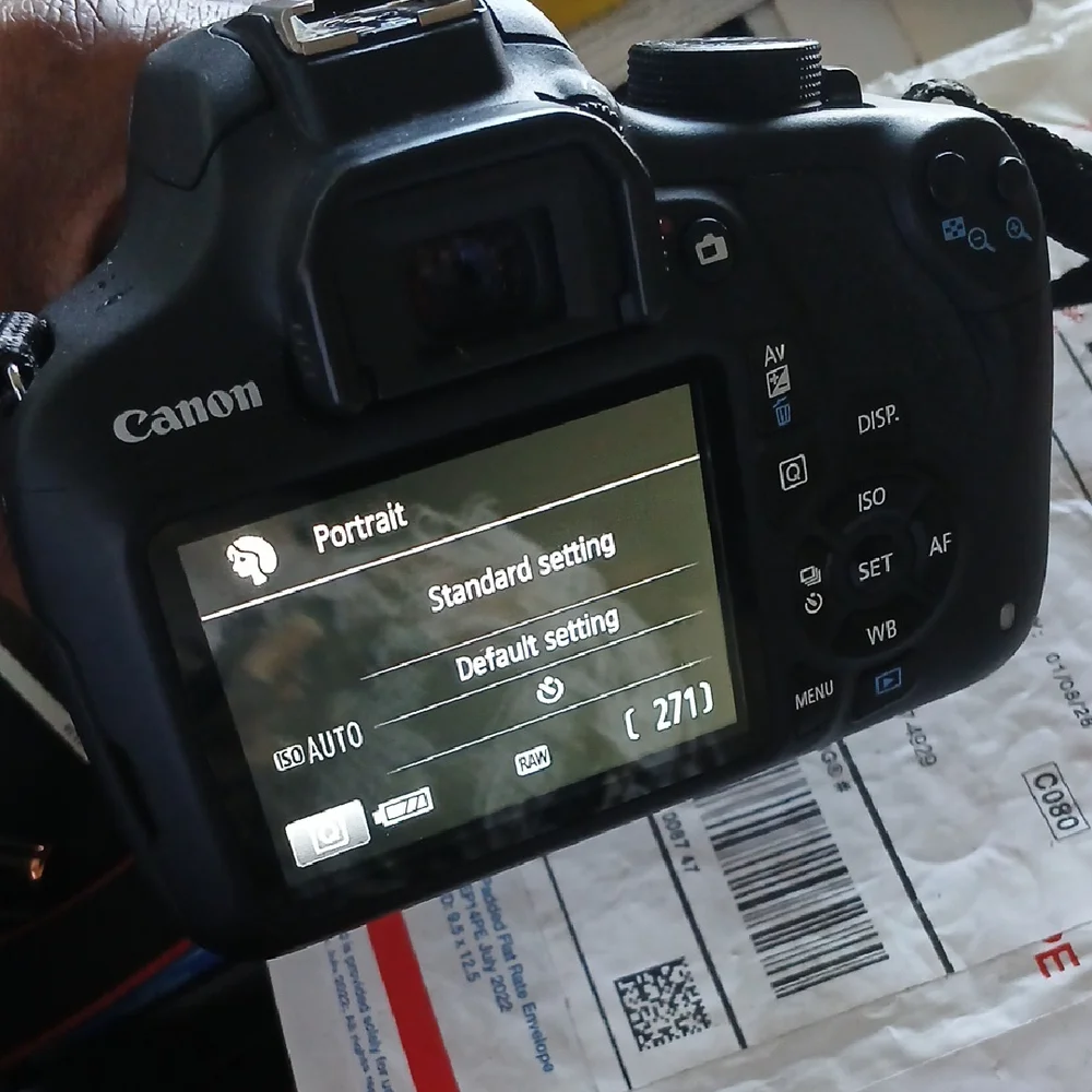 Canon Black EOS Camera with 200mm Lens